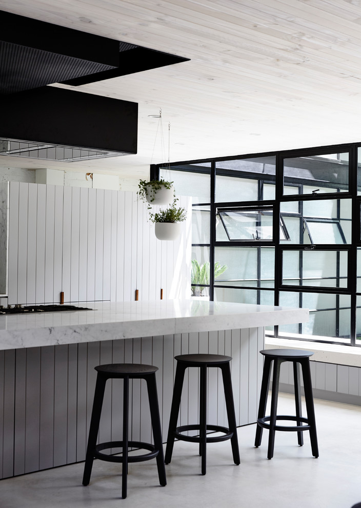 This is an example of a transitional kitchen in Melbourne.