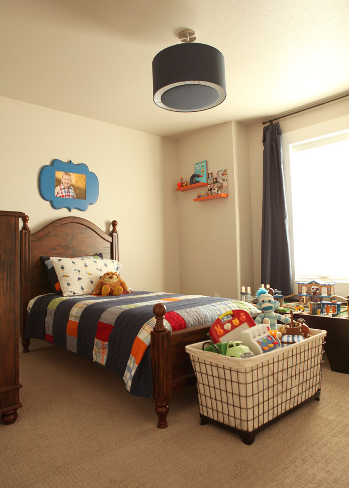 This is an example of a mid-sized traditional kids' room in Other with beige walls and carpet.