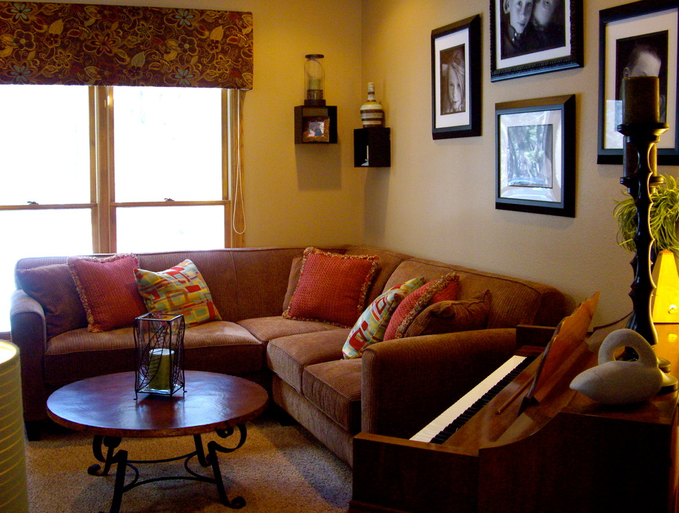Photo of a transitional family room in Denver.