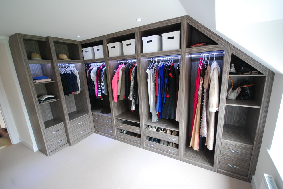 Photo of a contemporary storage and wardrobe in Sussex.