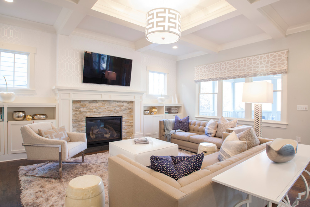 Design ideas for a transitional living room in Charlotte with white walls, dark hardwood floors, a standard fireplace, a stone fireplace surround and a wall-mounted tv.