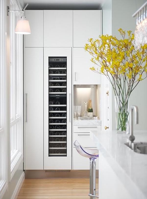 Design ideas for a small contemporary wine cellar in San Francisco with medium hardwood floors and storage racks.
