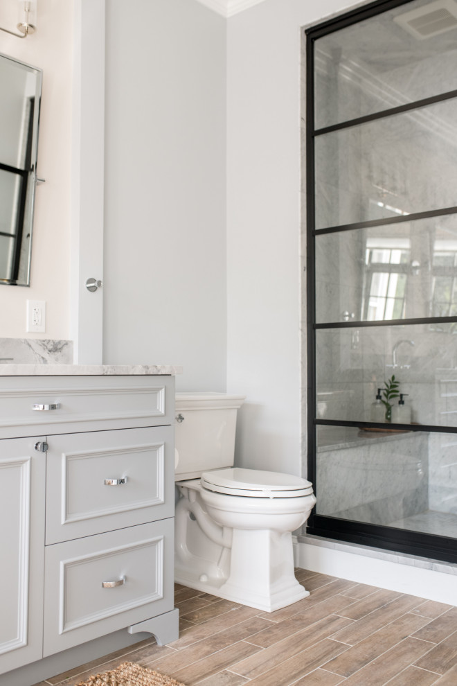 Example of a beach style home design design in Boston