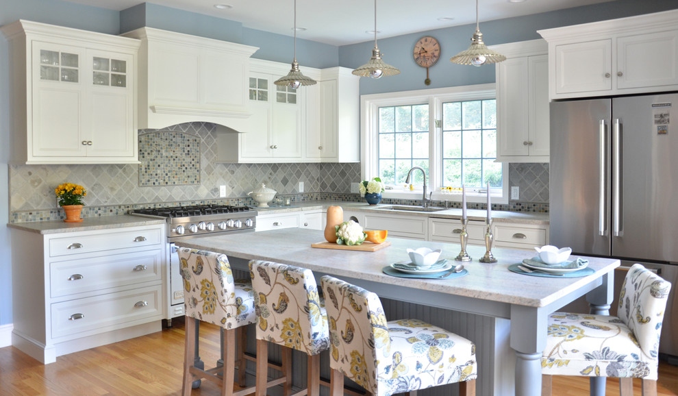 Traditional kitchen in Boston with beaded inset cabinets, granite benchtops and with island.