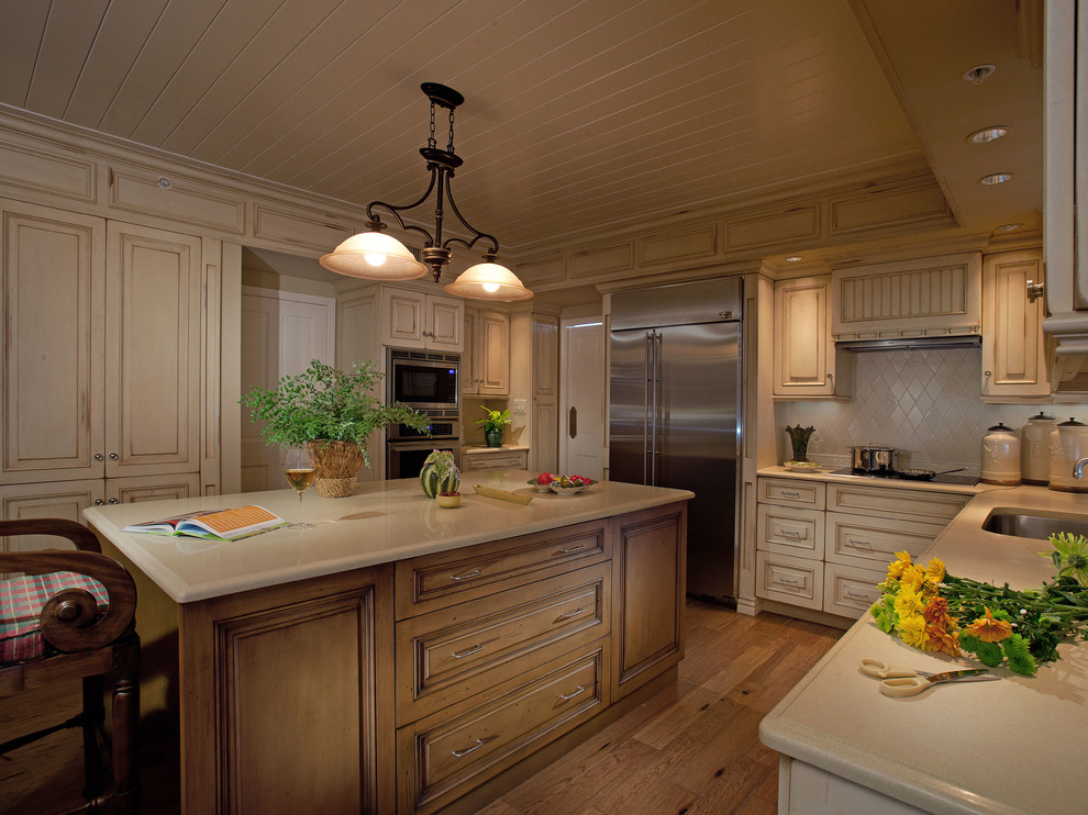 Inspiration for a traditional kitchen in Miami with stainless steel appliances.