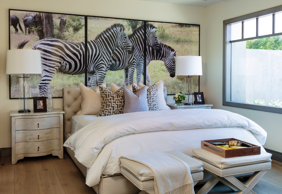 Bedroom - mid-sized transitional guest light wood floor bedroom idea in Orange County with white walls