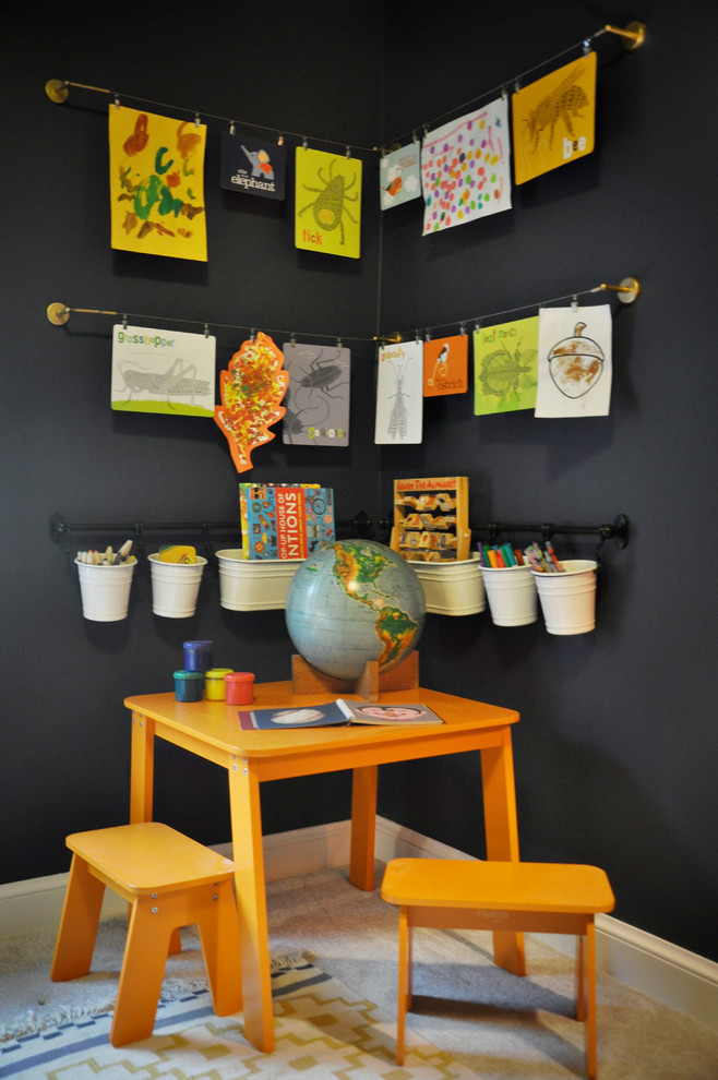 This is an example of a small traditional kids' room for boys in DC Metro with black walls and carpet.