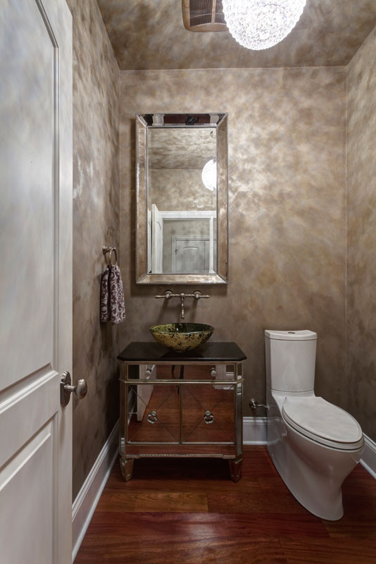 Photo of an eclectic powder room in Other.