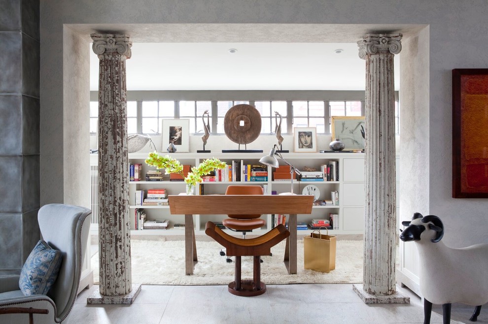 Inspiration for an eclectic study room in New York with a freestanding desk.