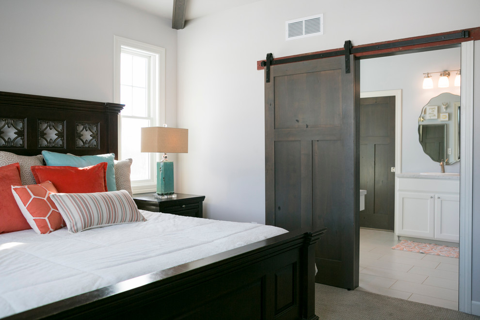 Inspiration for a mid-sized rustic master carpeted and beige floor bedroom remodel with white walls