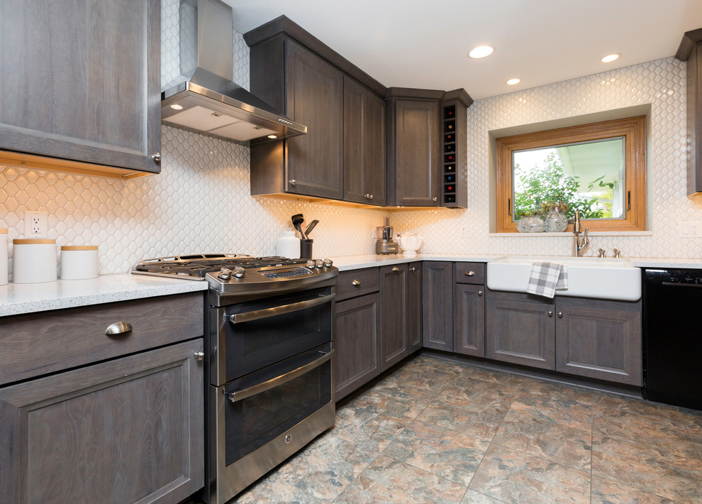 Inspiration for a mid-sized transitional l-shaped vinyl floor and gray floor eat-in kitchen remodel with a farmhouse sink, recessed-panel cabinets, gray cabinets, quartz countertops, white backsplash, ceramic backsplash, stainless steel appliances, no island and white countertops