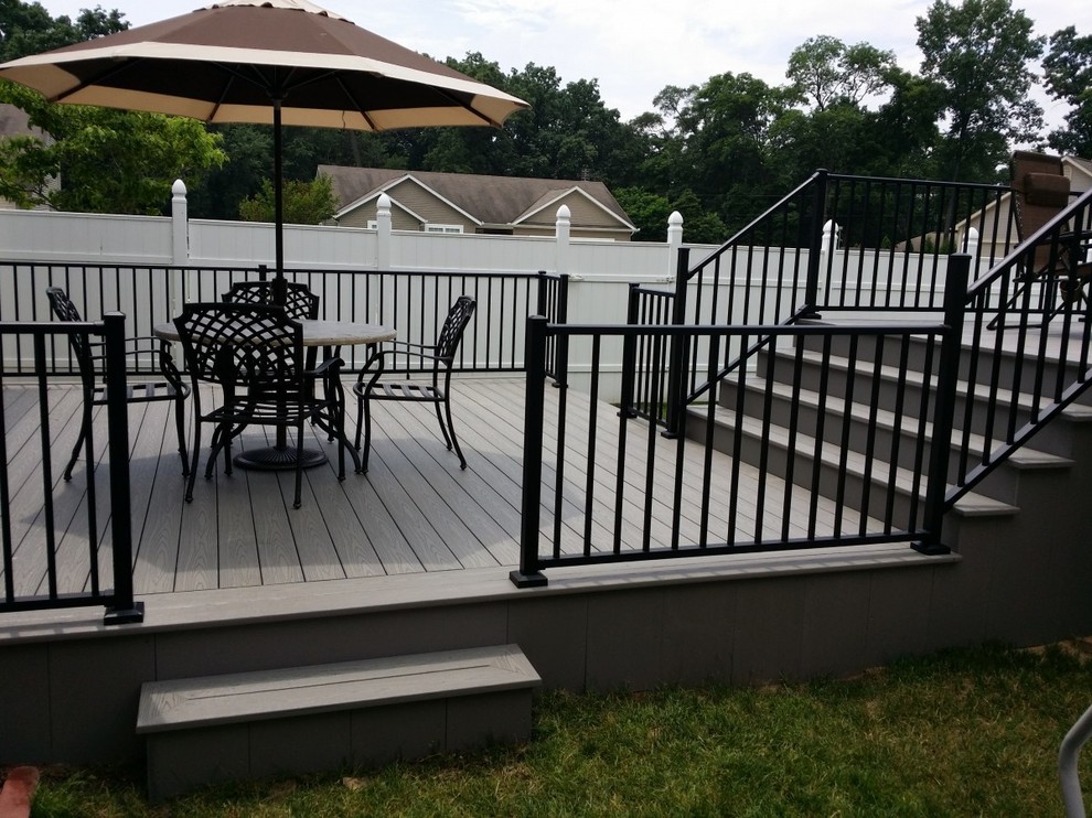 Large backyard deck photo with no cover