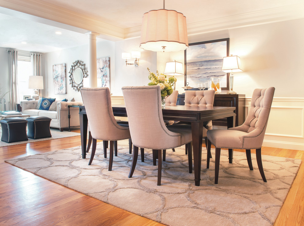 Transitional dining room photo in Boston with white walls
