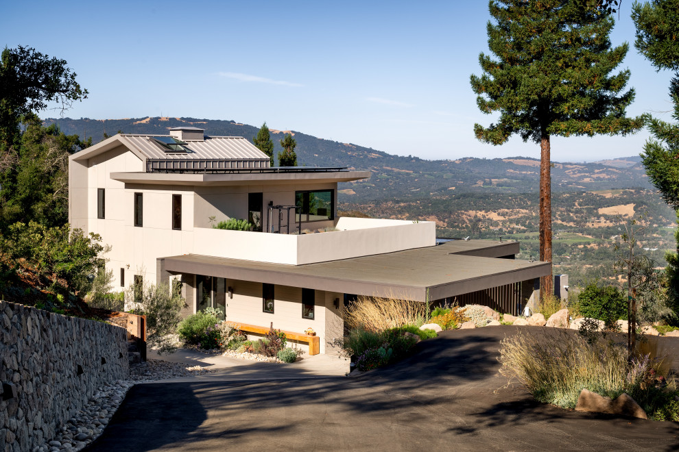 A little farm below a hillside resort-style off-the-grid view home ...