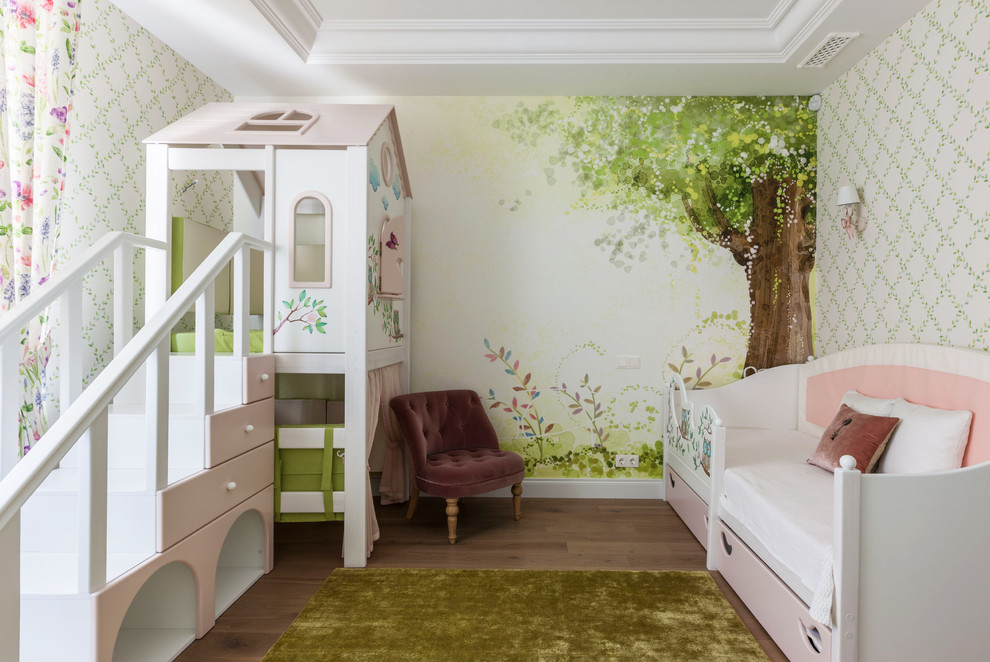 Design ideas for a transitional kids' playroom for kids 4-10 years old and girls in Moscow with multi-coloured walls and medium hardwood floors.
