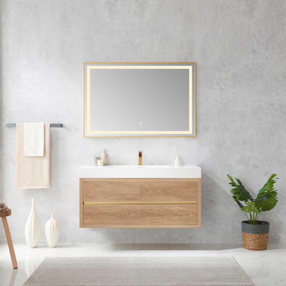 Imagen de cuarto de baño principal, único y flotante moderno con armarios con paneles lisos, puertas de armario de madera clara, lavabo integrado y encimeras blancas