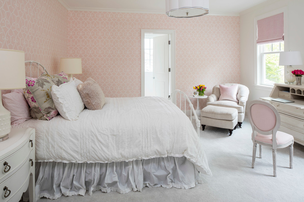 Traditional guest bedroom in DC Metro with pink walls, carpet and grey floor.