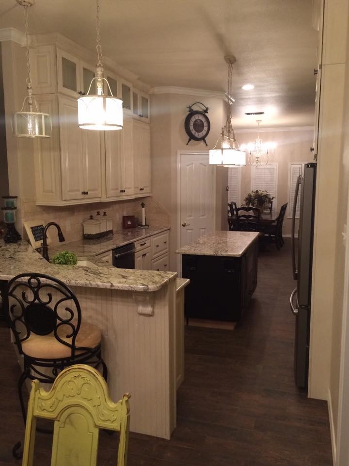 Example of a transitional kitchen design in Austin with granite countertops