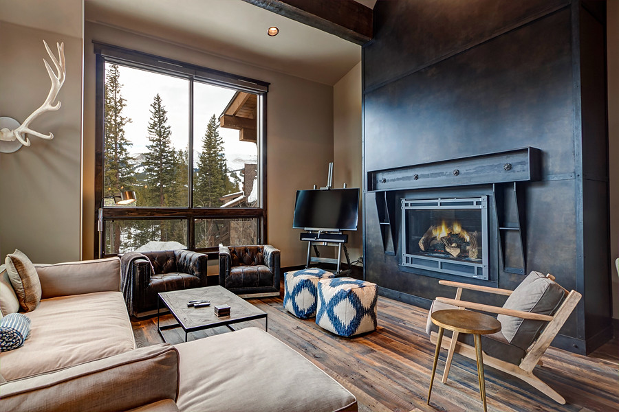 Inspiration for a transitional formal and open concept medium tone wood floor living room remodel in Denver with gray walls and a standard fireplace
