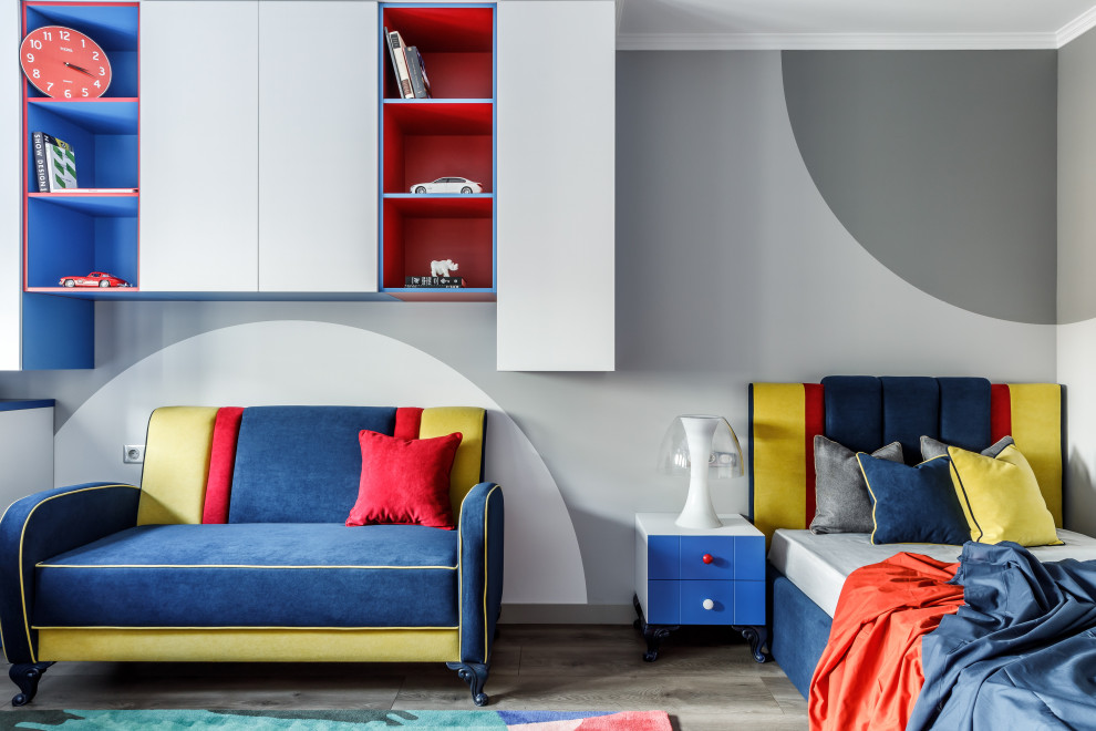 This is an example of a large contemporary gender-neutral kids' room in Other with medium hardwood floors, wallpaper, grey walls and grey floor.