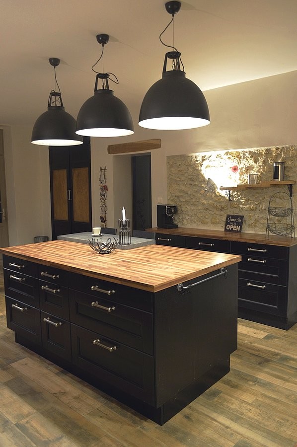 Mid-sized industrial u-shaped open plan kitchen in Other with a double-bowl sink, recessed-panel cabinets, black cabinets, wood benchtops, black splashback, ceramic splashback, stainless steel appliances, with island and beige benchtop.