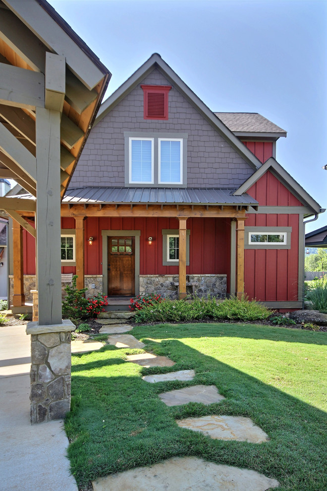 Inspiration for a mid-sized country two-storey red house exterior in Atlanta with mixed siding, a gable roof, a shingle roof, board and batten siding and shingle siding.