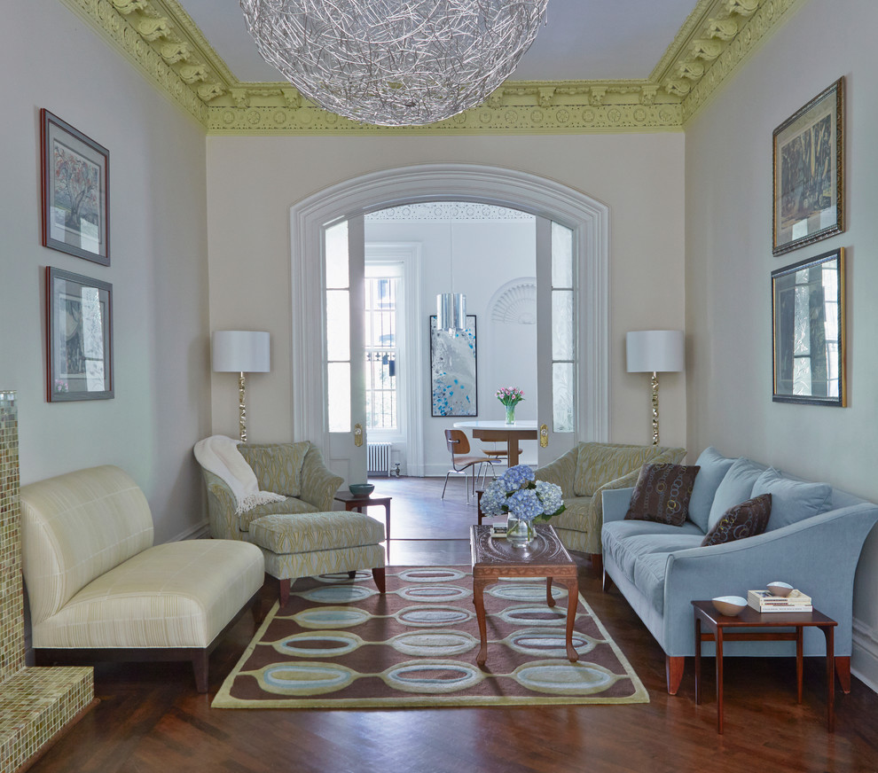 Transitional formal and enclosed dark wood floor living room photo in New York with beige walls and no tv