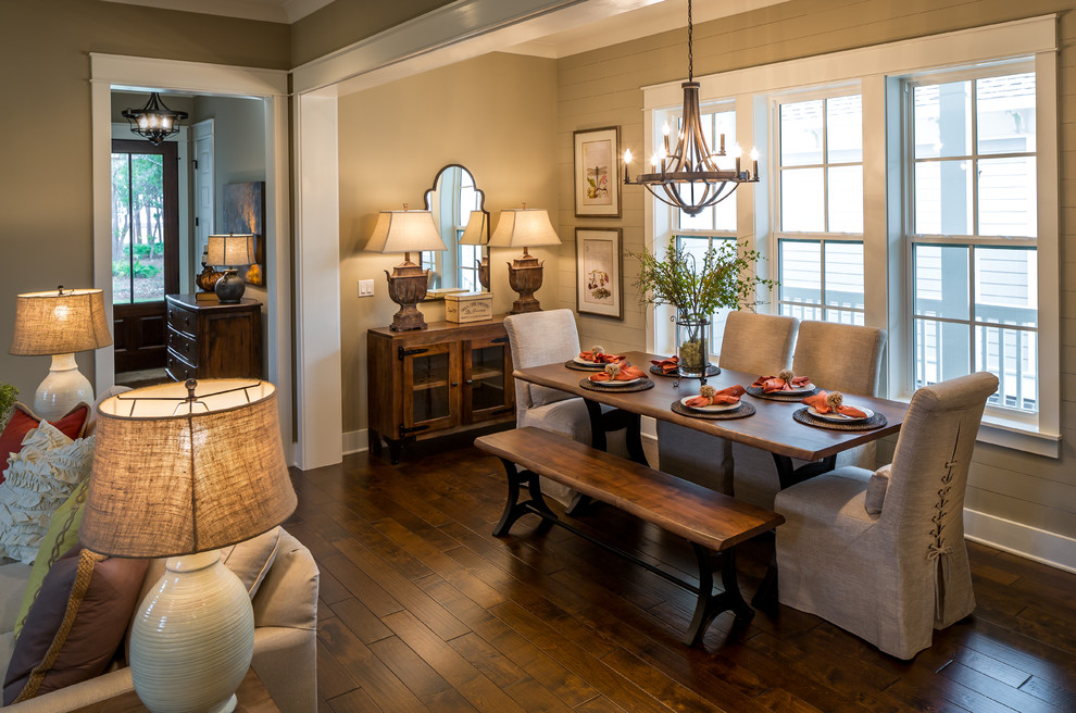 This is an example of a mid-sized country open plan dining in Miami with medium hardwood floors, no fireplace and beige walls.