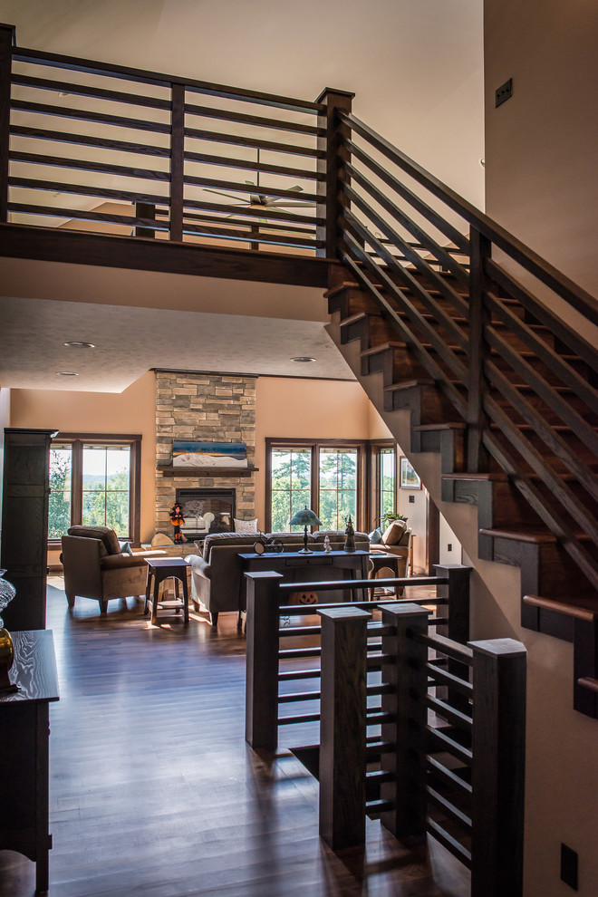 Design ideas for a large transitional wood straight staircase in Other with wood risers and wood railing.