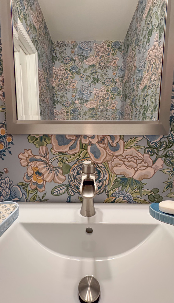 Small transitional wallpaper powder room photo in Baltimore with blue walls, white countertops and a freestanding vanity