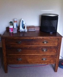Decluttered reception room used as a storage room