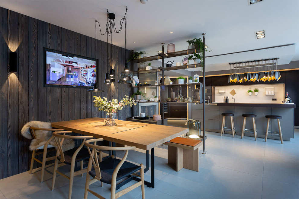 Inspiration for a large modern single-wall eat-in kitchen in Other with an integrated sink, flat-panel cabinets, dark wood cabinets, quartz benchtops, white splashback, engineered quartz splashback, stainless steel appliances, porcelain floors, with island and white benchtop.