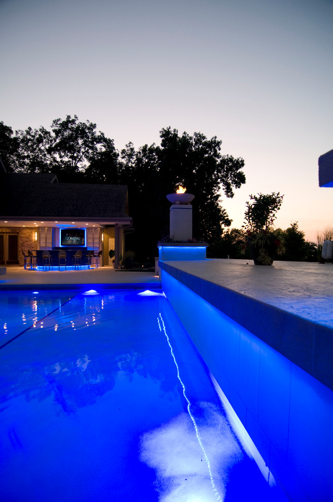 Hot tub - large transitional backyard concrete paver and rectangular natural hot tub idea in Cedar Rapids