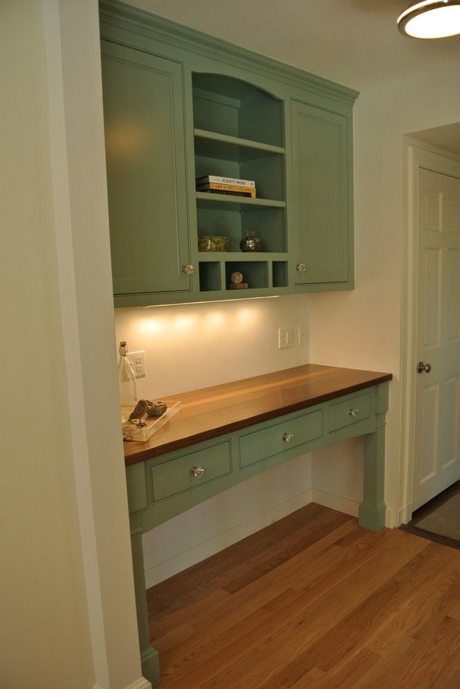 Eat-in kitchen - transitional light wood floor eat-in kitchen idea in Boston with an undermount sink, shaker cabinets, granite countertops, white backsplash, subway tile backsplash, stainless steel appliances and an island