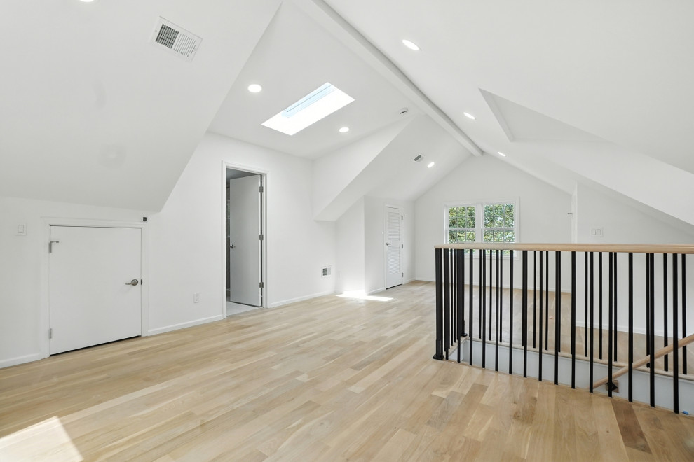 Vaulted Loft with Skylight and Hardwood