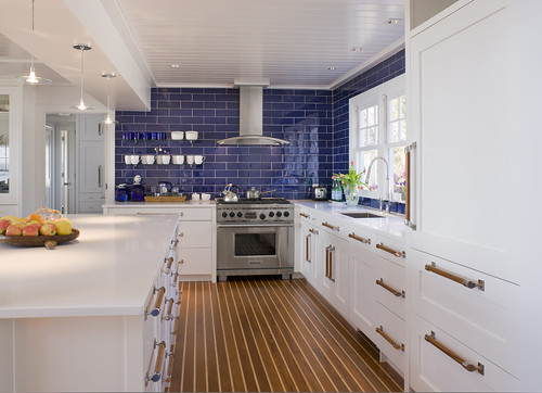 White kitchen with blue backsplash