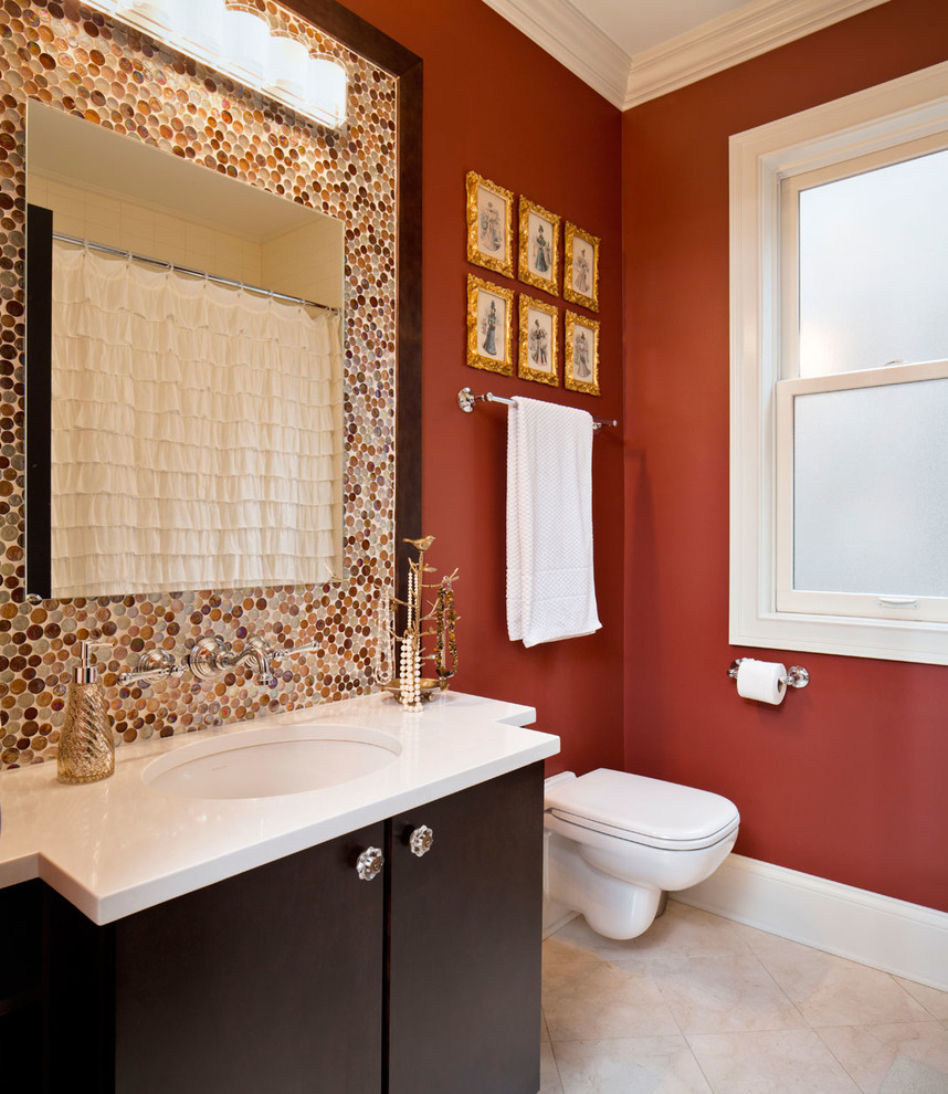 Mid-sized transitional kids bathroom in Chicago with a wall-mount sink, flat-panel cabinets, dark wood cabinets, limestone benchtops, beige tile, ceramic tile, red walls and ceramic floors.