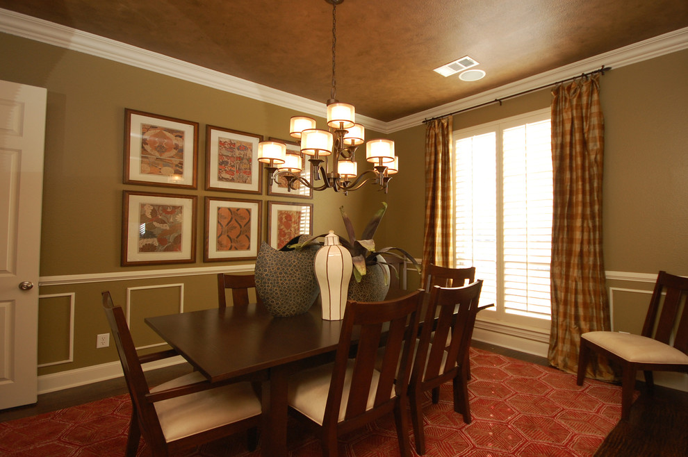 This is an example of a transitional dining room in Dallas.