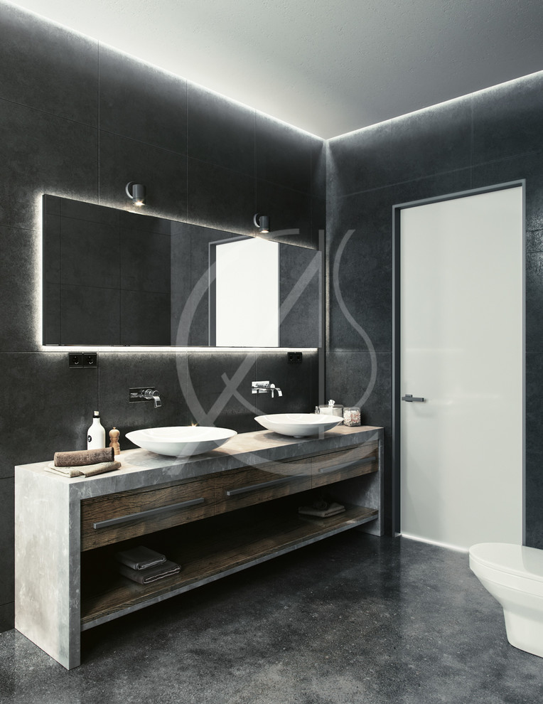 Photo of a mid-sized industrial master bathroom in London with flat-panel cabinets, a one-piece toilet, concrete floors, a vessel sink, concrete benchtops, grey floor, grey benchtops, medium wood cabinets, ceramic tile and grey walls.