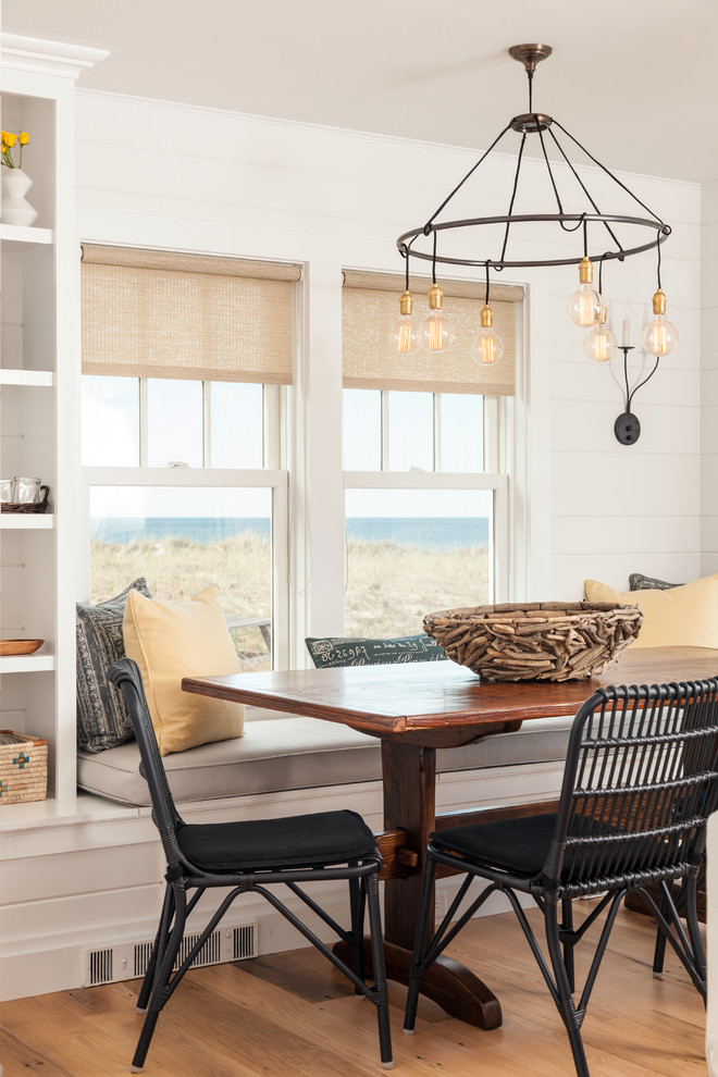 Inspiration for a beach style dining room in Boston.