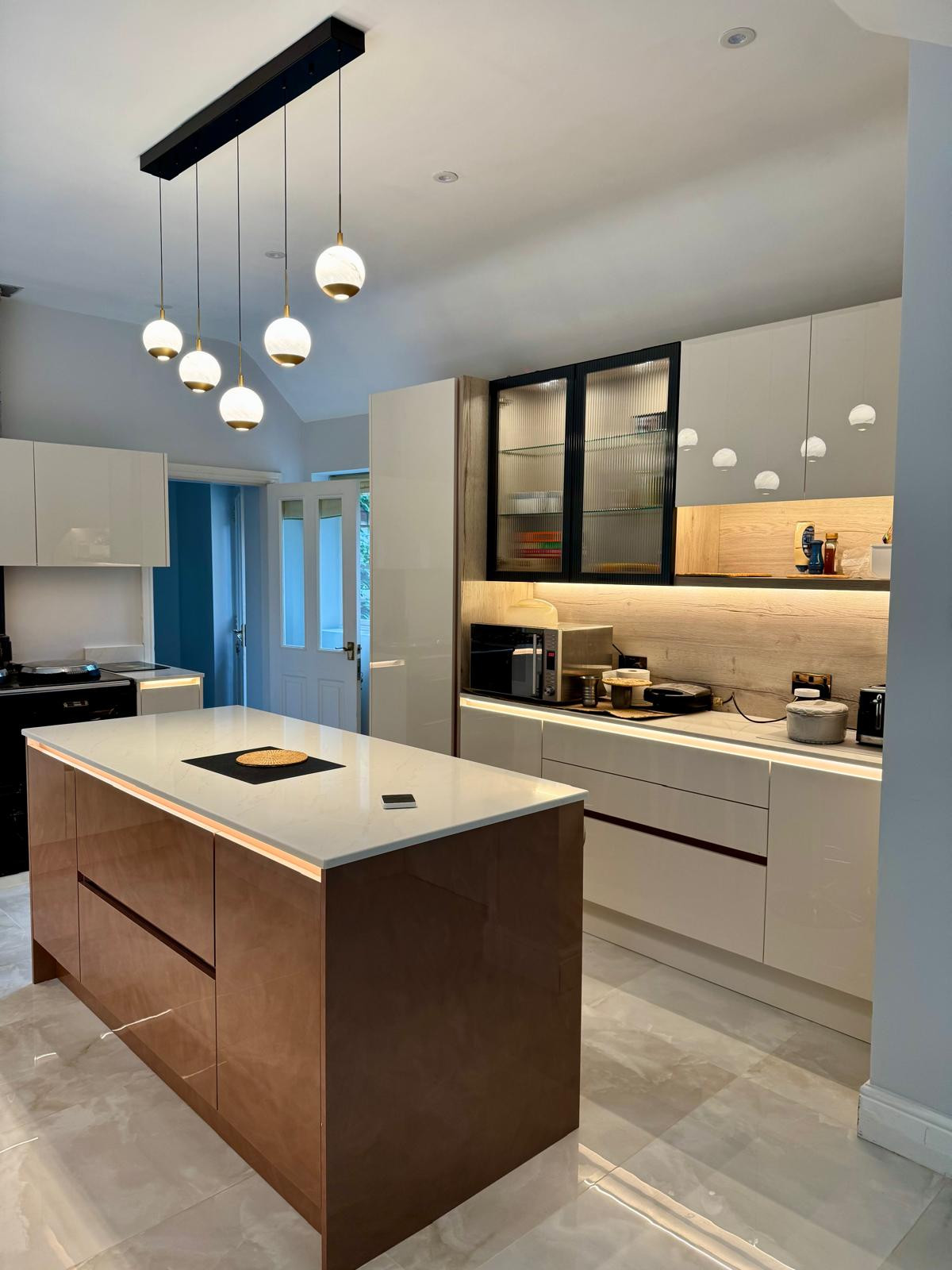 Example of a minimalist kitchen design in West Midlands