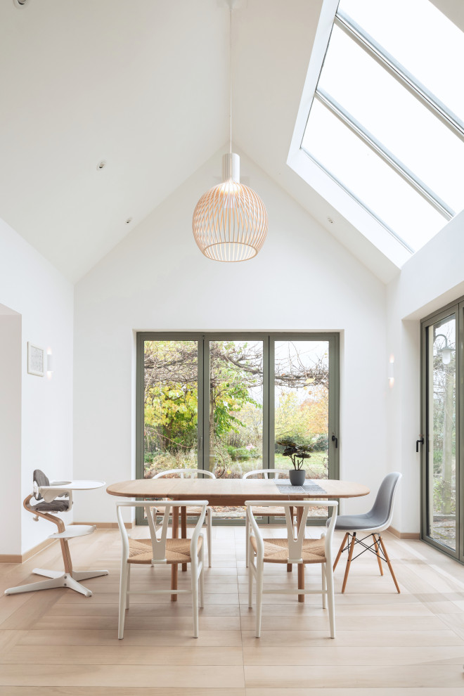 Design ideas for a scandinavian dining room in Cambridgeshire.