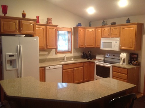 kitchen cabinets- leave honey oak or paint white? mocked up photo