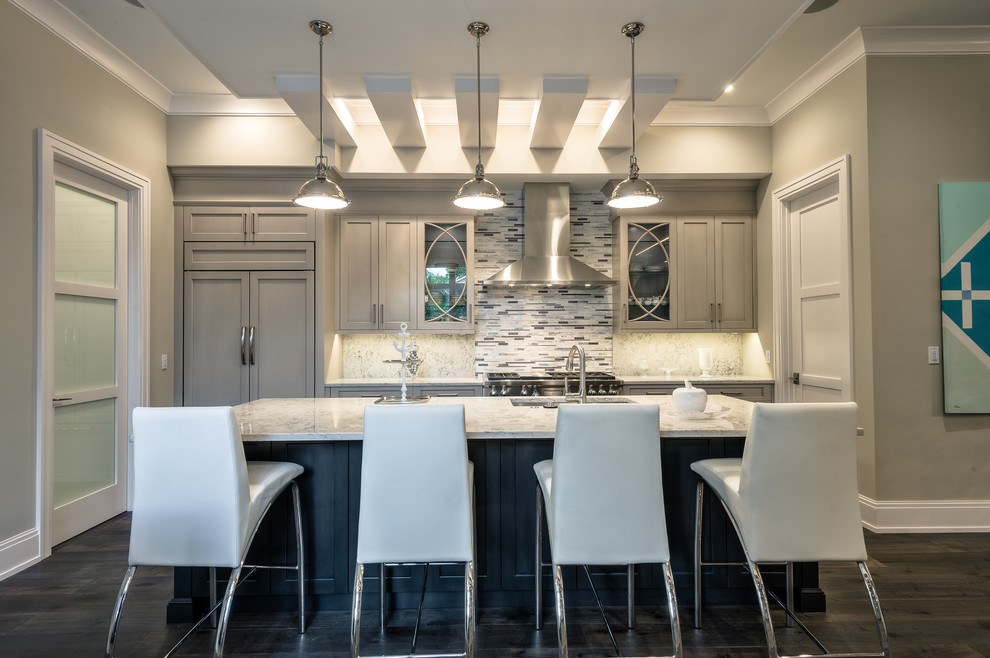 Example of a transitional home design design in Miami