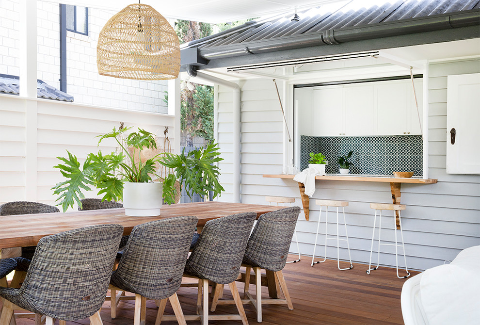 Beach style deck in Brisbane with an awning.