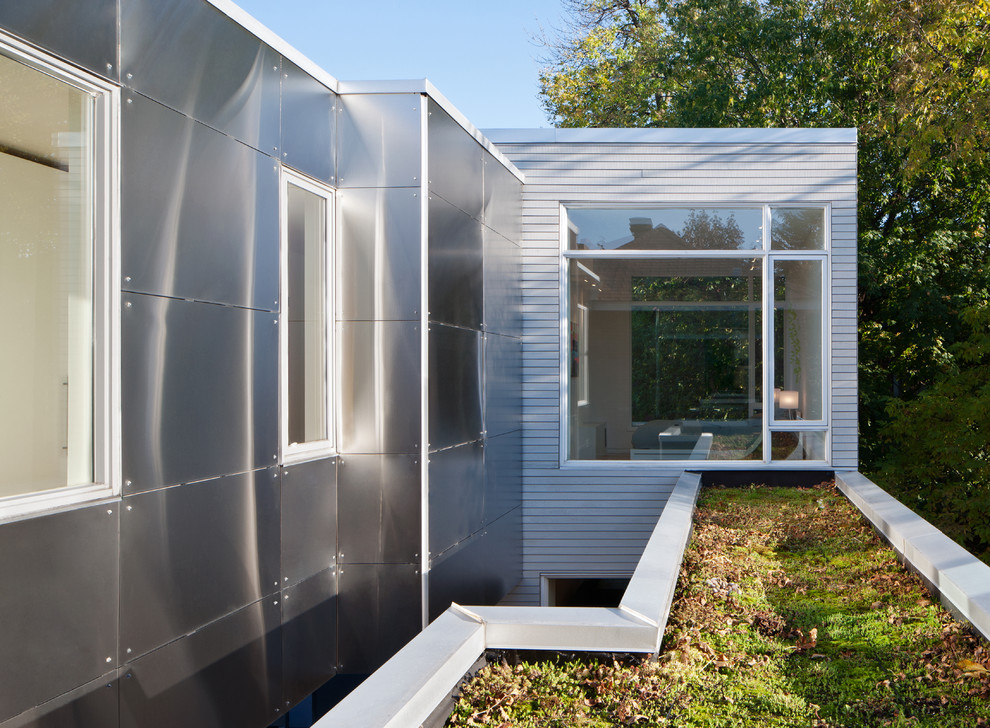 Photo of a contemporary exterior in Ottawa with metal siding.