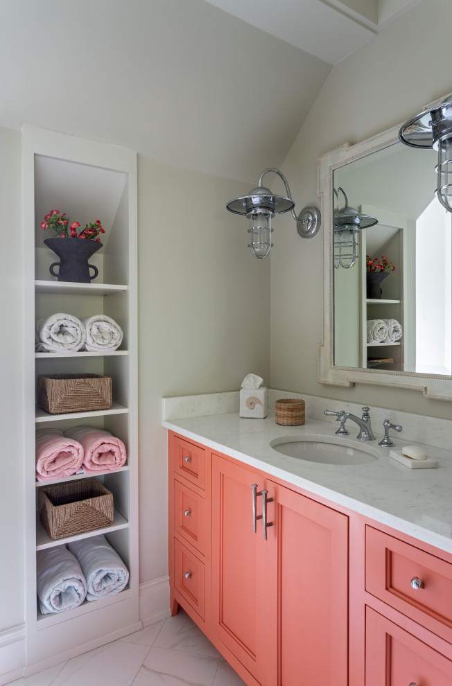 Photo of a beach style bathroom in Charleston with recessed-panel cabinets, orange cabinets, white walls, an undermount sink, white floor, white benchtops, a single vanity, a built-in vanity and vaulted.