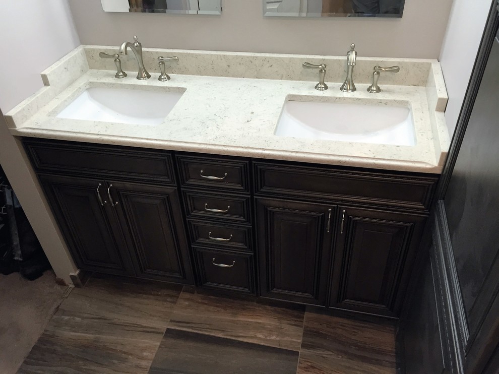 Inspiration for a mid-sized transitional master porcelain tile home design remodel in Chicago with raised-panel cabinets, gray cabinets, a two-piece toilet, an undermount sink and quartz countertops