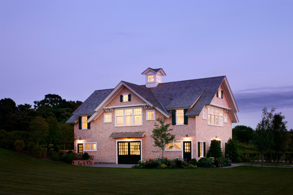 Photo of an expansive beach style detached garage in Boston.