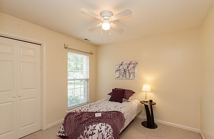 Example of a transitional bedroom design in Cedar Rapids